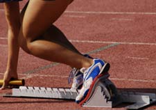 photo  of track runner on her mark