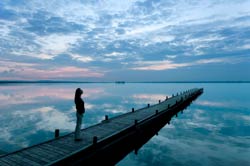 photo of woman on jetty