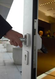 photo of person opening a door