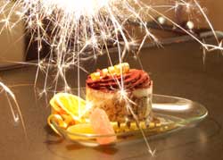 photo of dessert with sparklers