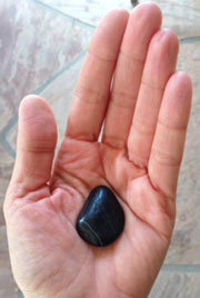 photo of a stone in palm of hand